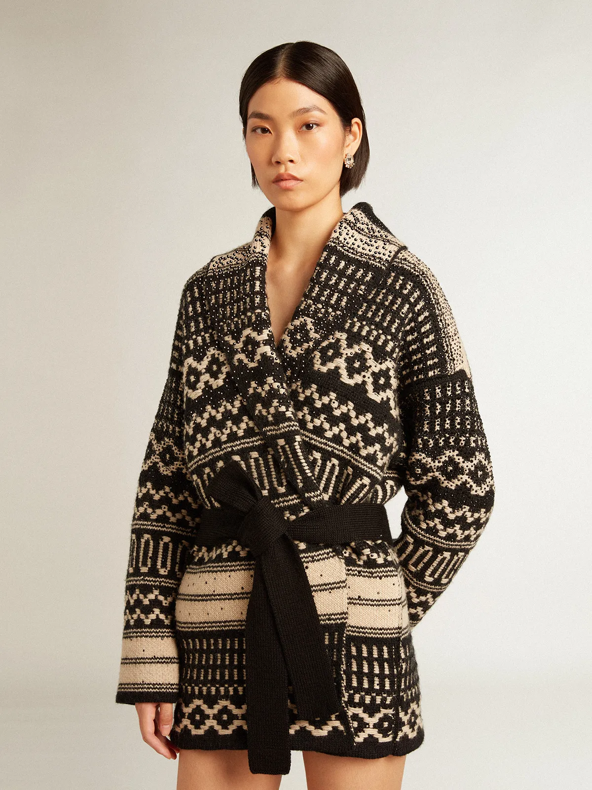 Women’s cardigan in ecru wool with jacquard design and belt